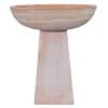 Terracotta birdbath bowl mounted on a pedestal base.