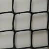 Black plastic mesh netting material with square openings arranged in a grid pattern.