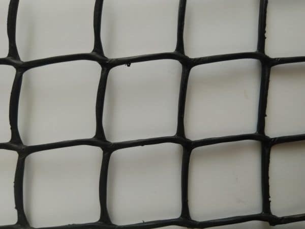Black plastic mesh netting material with square openings arranged in a grid pattern.