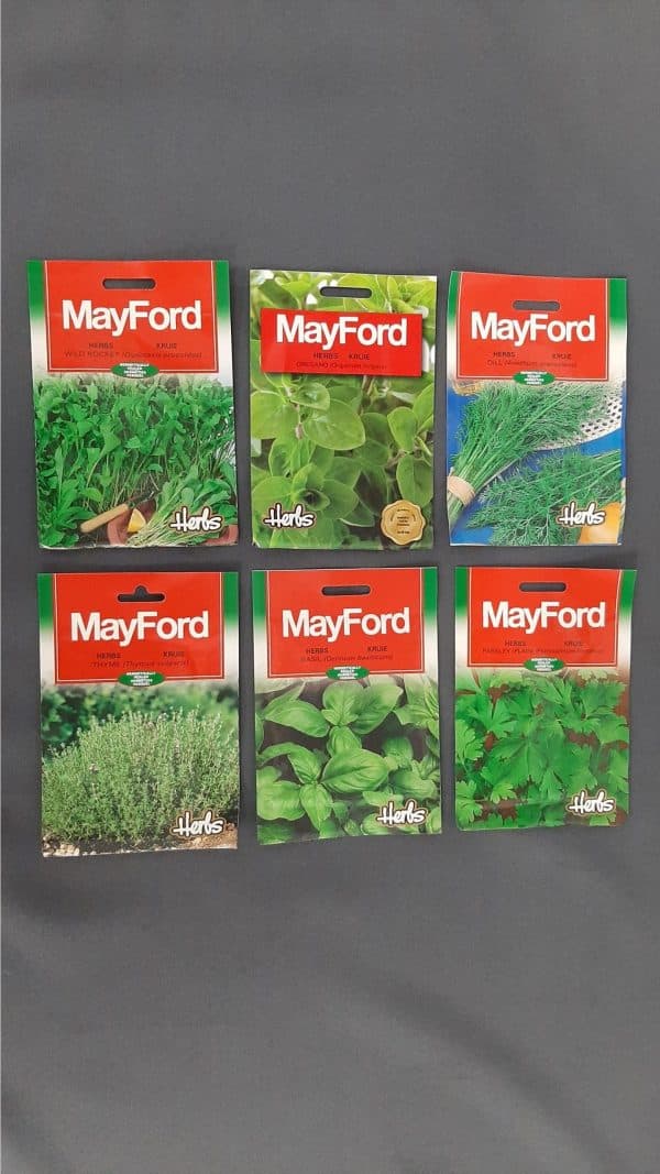 Six pack of various Mayford herb seeds against a black background.