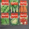 Six pack of various Mayford vegetable seeds against a black background.