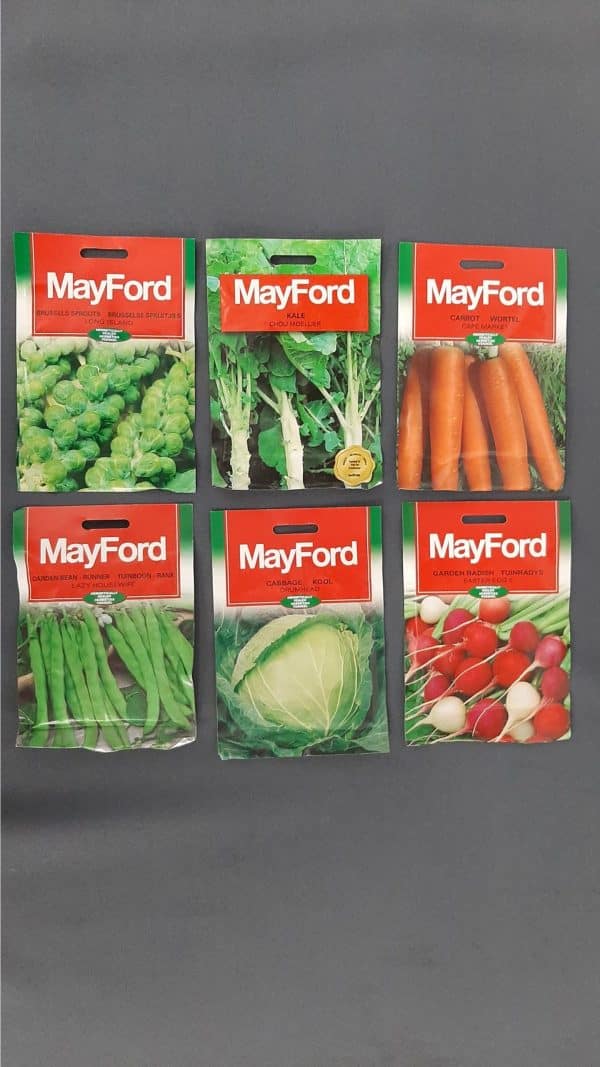 Six pack of various Mayford vegetable seeds against a black background.
