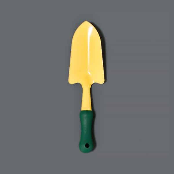 A yellow gardening trowel with a green handle.