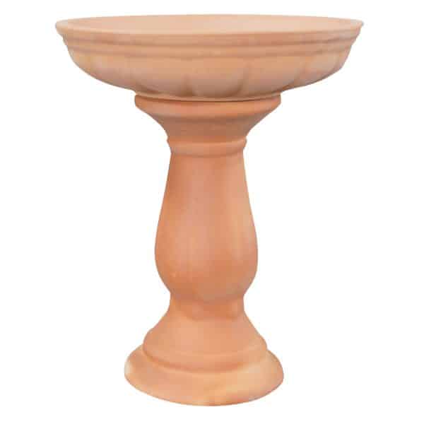 Terracotta planter with decorative ribbed design on a pedestal base.