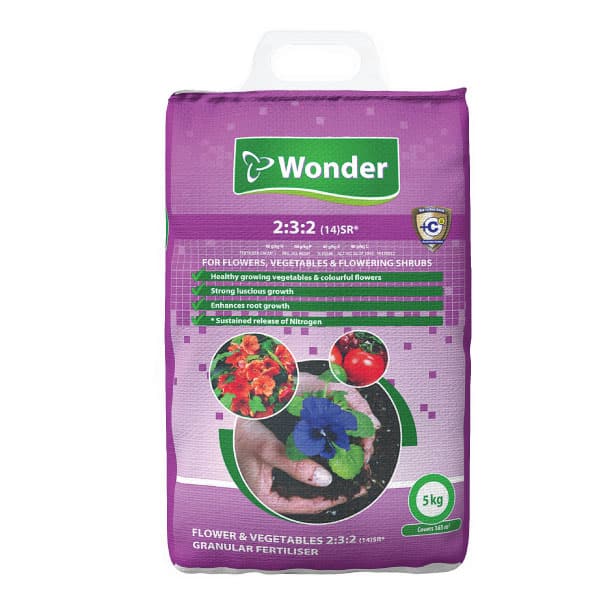 A purple-coloured bag of Wonder 2:3:2 fertiliser with a small white handle.