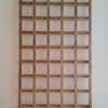 Wooden trellis or garden lattice with criss-cross pattern