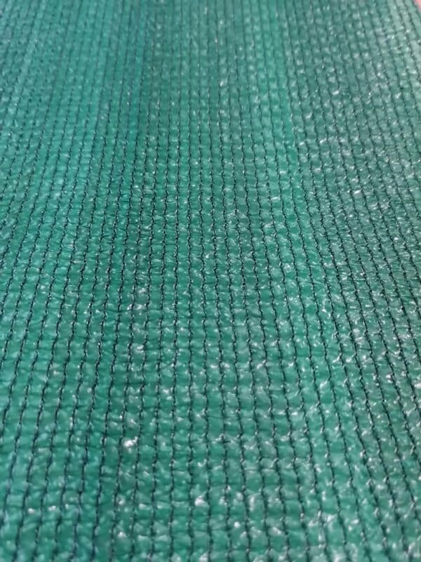 A close-up of green shade net.