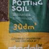 A bag of Stodels potting soil.