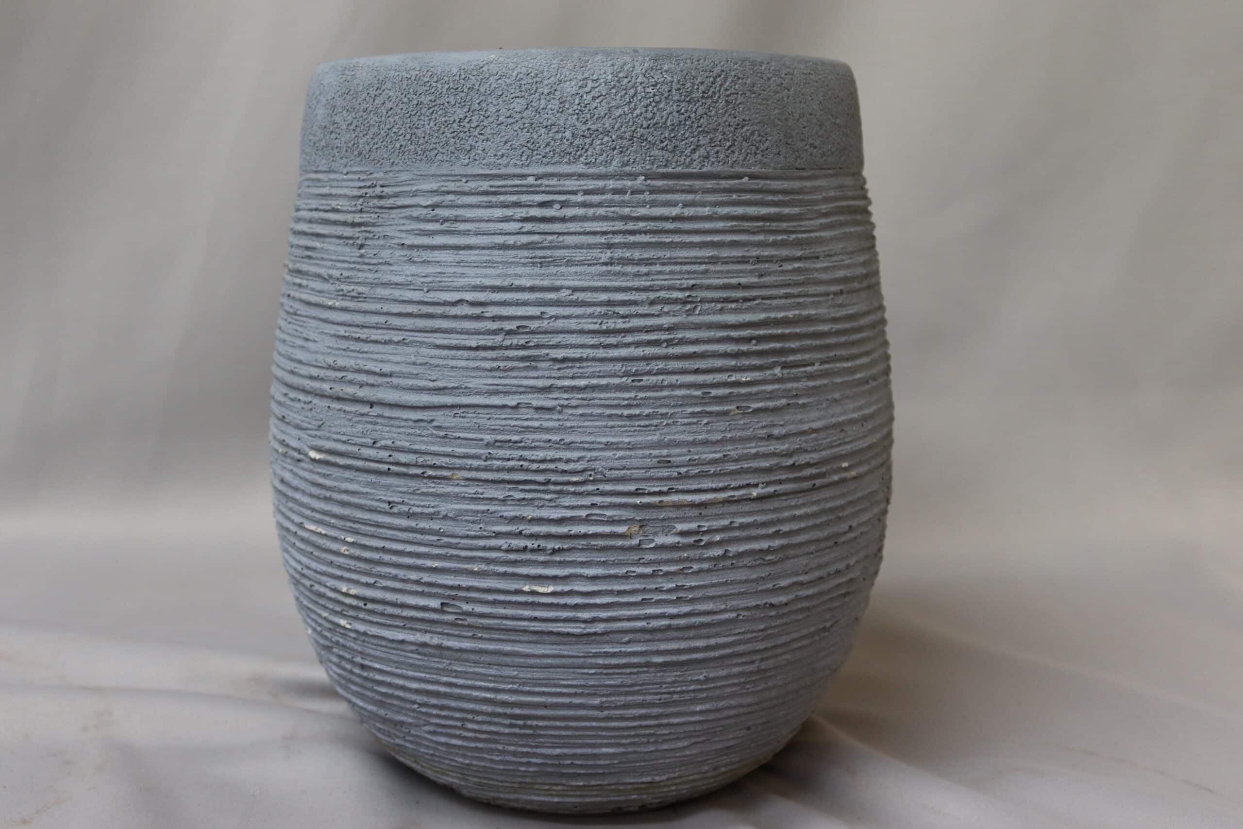 Medium-sized grey fibre cement Benson belly plant pot.