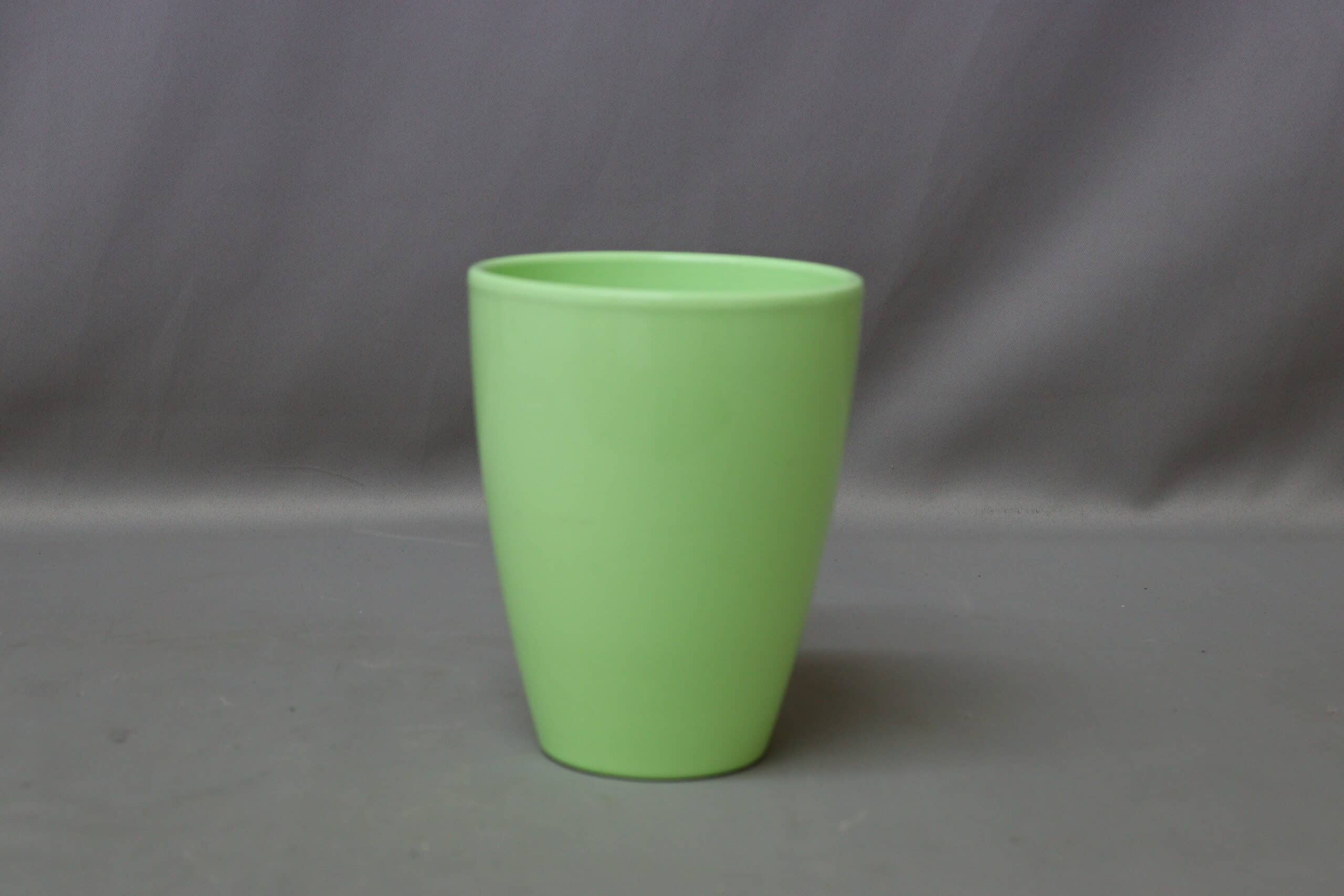 Apple green pot cover for potted plants.