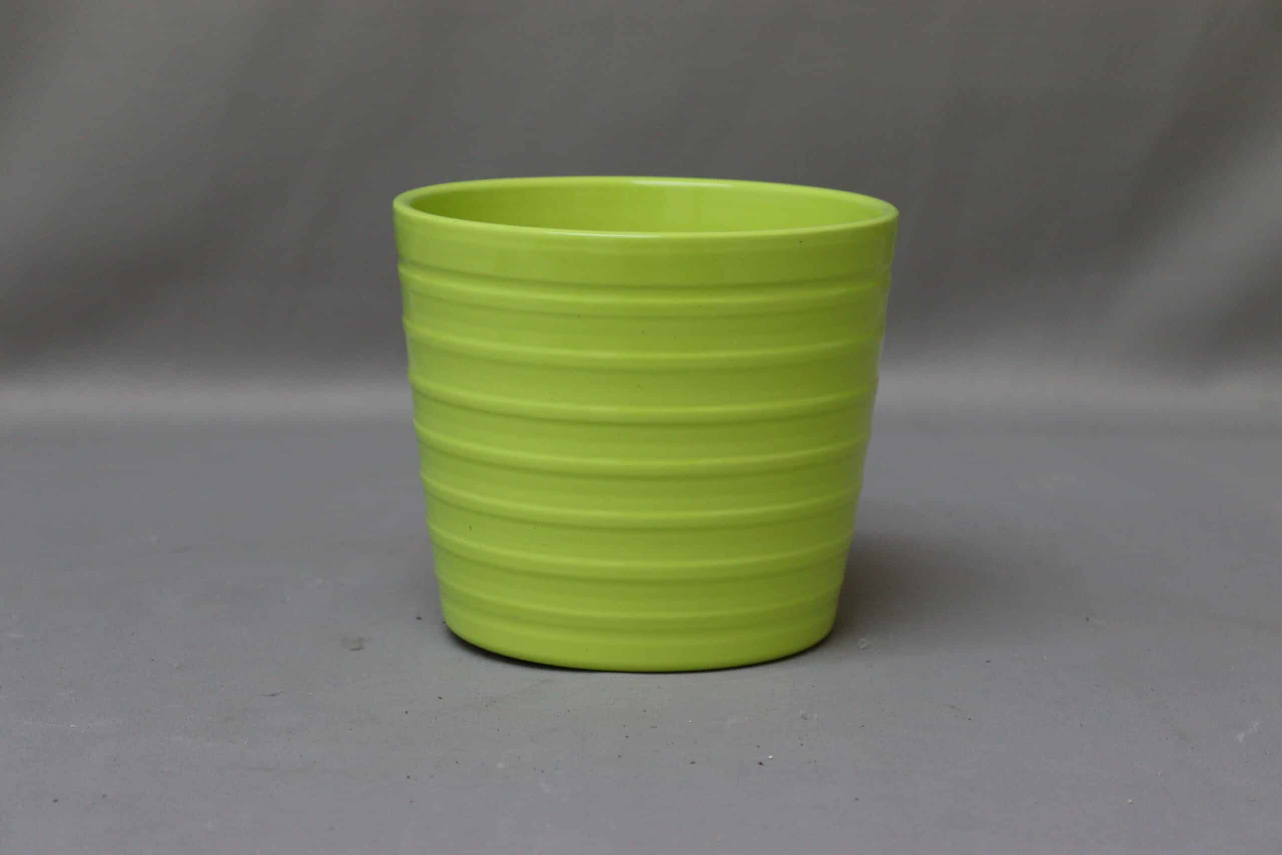 Apple green ribbed pot cover for potted plants.